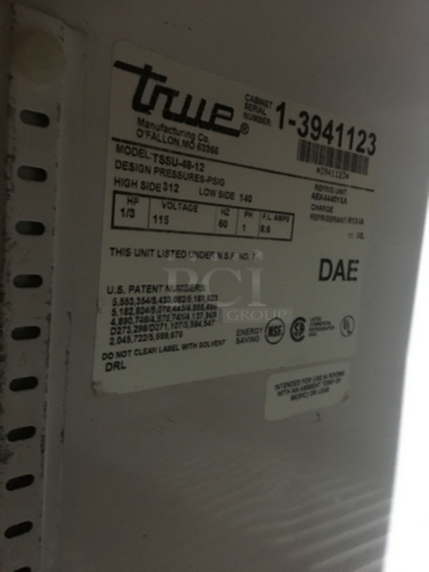True Commercial Refrigerated Sandwich Prep Table! With 2 Door Underneath Storage Space! All Stainless Steel! Model TSSU4812 Serial 13941123! 115V 1Phase! On Commercial Casters!
 - Image 8 of 11