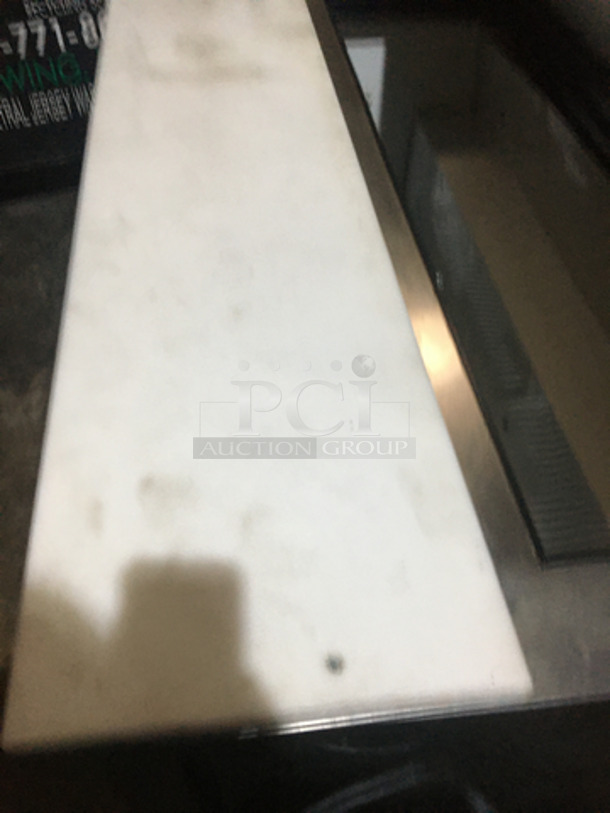 True Commercial Refrigerated Sandwich Prep Table! With 2 Door Underneath Storage Space! All Stainless Steel! Model TSSU4812 Serial 13941123! 115V 1Phase! On Commercial Casters!
 - Image 10 of 11