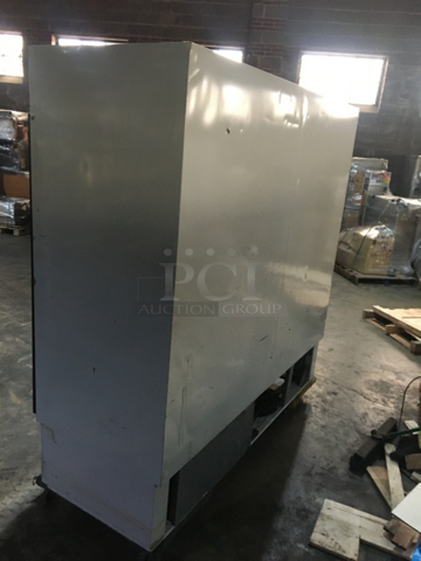 Hussmann Commercial 3 Door Reach In Refrigerator Merchandiser! With Poly Coated Racks! Model RR0721G41 Serial 95B32210! 115V 1Phase! - Image 4 of 9