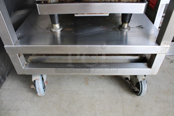 Stainless Steel Commercial 2 Tier Equipment Table on Commercial Casters. Goes GREAT w/ Item # 4-5! 24x30x43 - Image 4 of 4