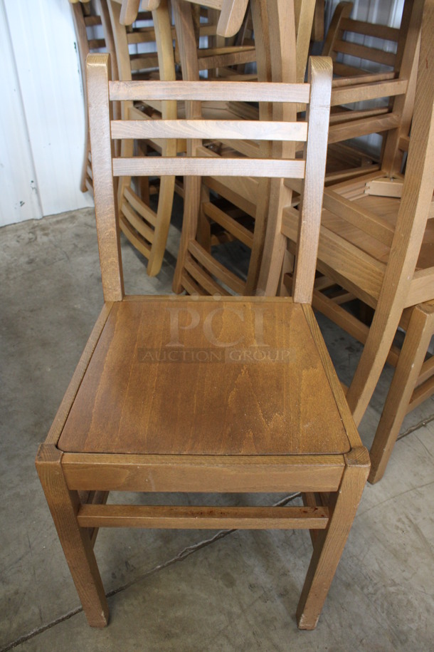 4 Wooden Dining Chairs w/ Horizontal Back Rest Bars. Stock Picture - Cosmetic Condition May Vary. 14x16x32. 4 Times Your Bid! - Image 1 of 5