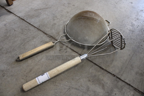 2 Various Items; Strainer and Masher. 23x10x4, 5x5x19. 2 Times Your Bid!