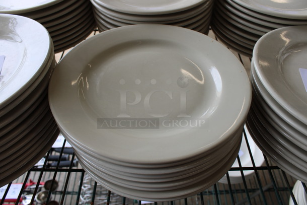 9 White Ceramic Plates. 10x10x1. 9 Times Your Bid!
