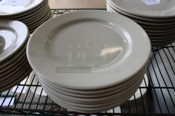 10 White Ceramic Plates. 12x12x1. 10 Times Your Bid!