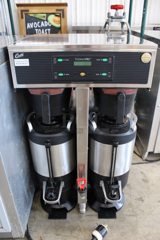 Curtis Model TP2T10A3159 Stainless Steel Commercial Countertop Dual Coffee Machine w/ Hot Water Dispenser, 2 Stainless Steel Servers and 2 Poly Brew Baskets. 220 Volts, 1 Phase. 20x18x35.5