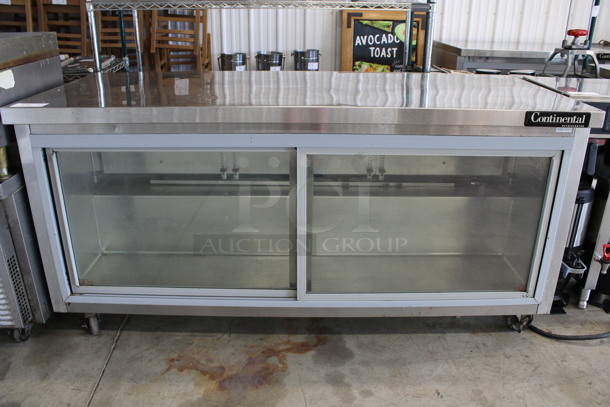Continental Model SW72-SGD Stainless Steel Commercial 2 Door Undercounter Cooler on Commercial Casters. 115 Volts, 1 Phase. 72x30x35.5. Tested and Working!