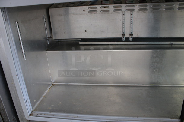 Continental Model SW72-SGD Stainless Steel Commercial 2 Door Undercounter Cooler on Commercial Casters. 115 Volts, 1 Phase. 72x30x35.5. Tested and Working! - Image 4 of 6