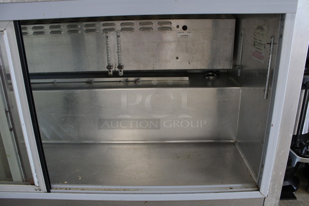 Continental Model SW72-SGD Stainless Steel Commercial 2 Door Undercounter Cooler on Commercial Casters. 115 Volts, 1 Phase. 72x30x35.5. Tested and Working! - Image 5 of 6