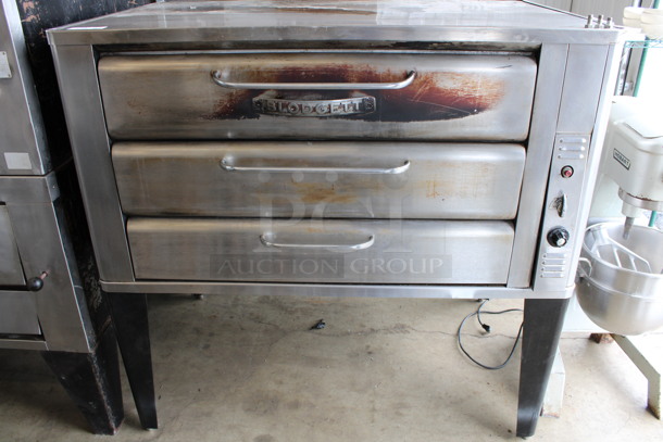 FANTASTIC! Blodgett Model 981 Stainless Steel Commercial Natural Gas Powered Double Deck Pizza Oven on Metal Legs. 50,000 BTU. 60x39x63 - Image 1 of 9