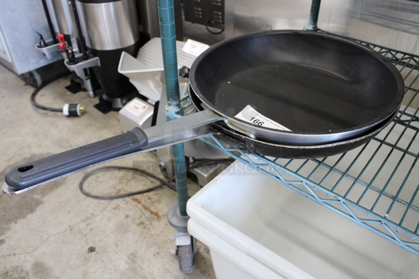 2 Metal Skillets. Includes 26x14.5x2. 2 Times Your Bid!