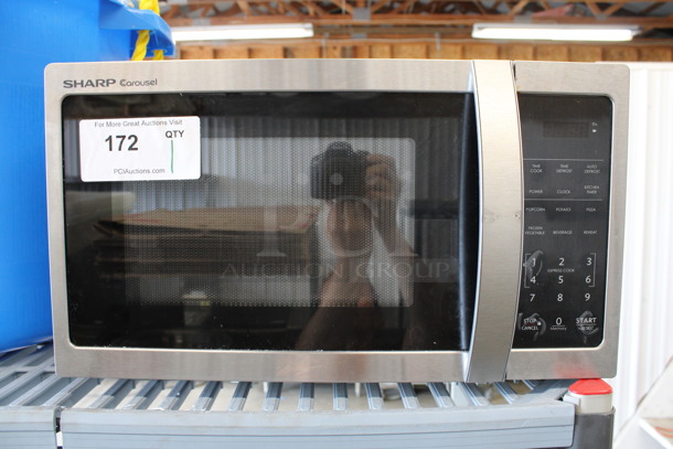Sharp Carousel Chrome Finish Countertop Microwave Oven w/ Plate. 19x14x11