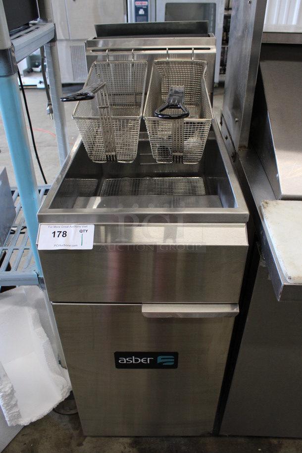 SWEET! 2021 Asber Model AEF Stainless Steel Commercial Floor Style Natural Gas Powered Deep Fat Fryer w/ 2 Metal Fry Baskets on Commercial Casters. 105,000 BTU. 15.5x31x48