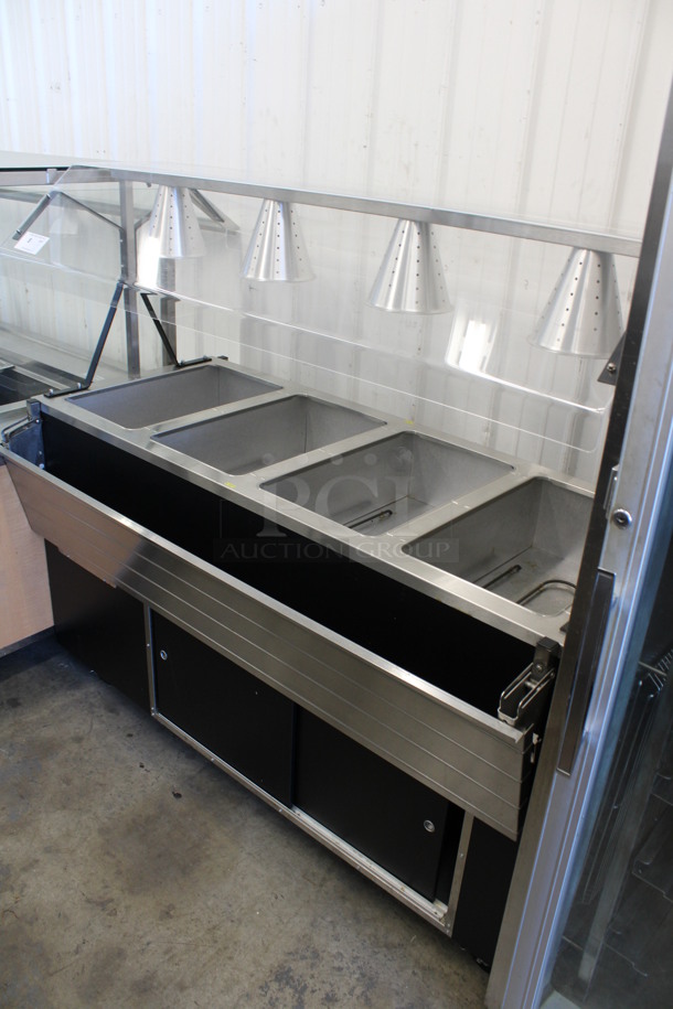 Stainless Steel Commercial Electric Powered 4 Bay Steam Table w/ Sneeze Guard, 4 Lamps and Tray Slide on Commercial Casters. 125/250 Volts, 1 Phase. 60x36x58