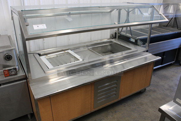 Stainless Steel Commercial Buffet Table w/ Sneeze Guard and Tray Slide on Commercial Casters. 115 Volts, 1 Phase. 72x51x57. Tested and Working!