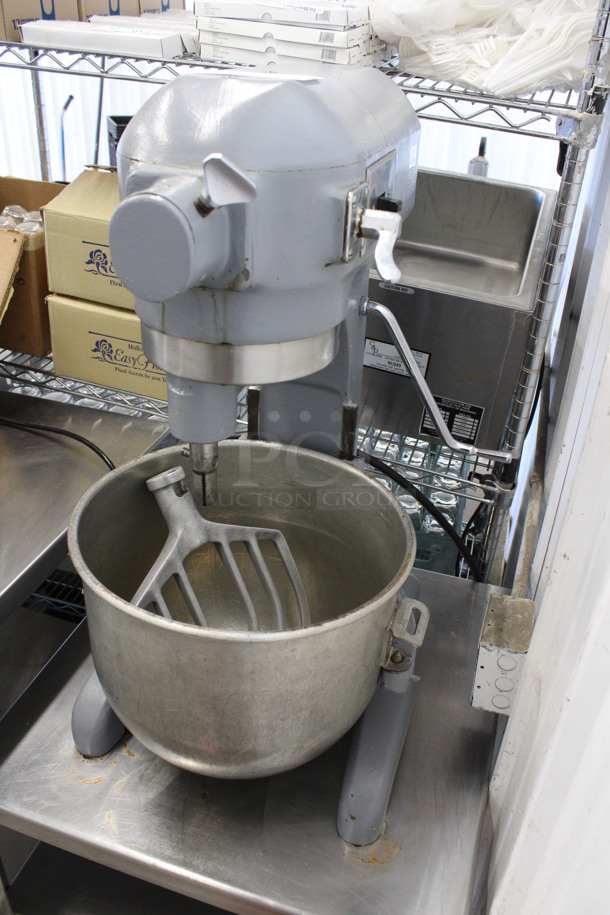 Hobart Model A-200 Metal Commercial Countertop 20 Quart Planetary Mixer w/ Stainless Steel Mixing Bowl and Paddle Attachment on Stainless Steel Equipment Stand. 115 Volts, 1 Phase. 18x23x30, 24x24x21. Tested and Working!