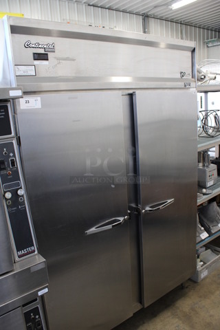 Continental Model I-2RDA-2S Stainless Steel Commercial 2 Door Reach In Cooler. 115 Volts, 1 Phase. 58x34x83. Tested and Working!
