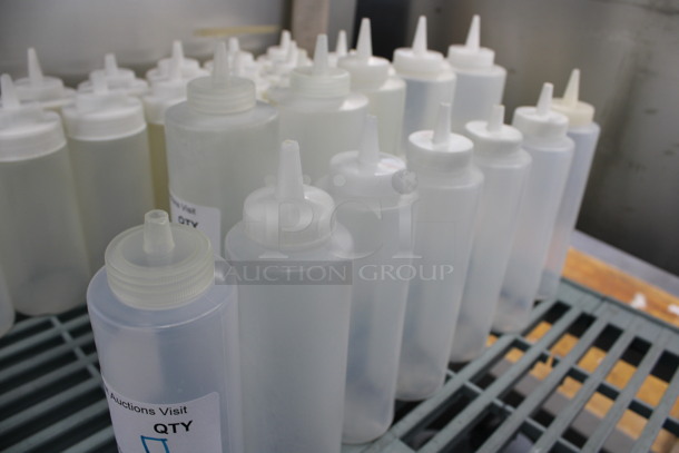 7 Clear Poly Condiment Bottles. 2.5x2.5x7.5. 7 Times Your Bid! - Image 3 of 3