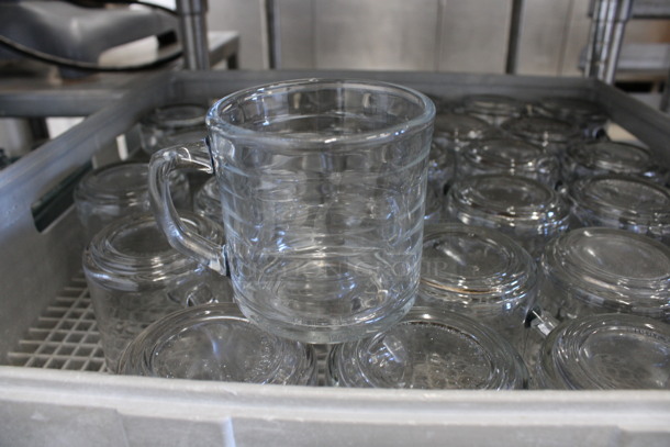 30 Glass Mugs in Dish Caddy. 4.5x3.5x3.5. 30 Times Your Bid! - Image 1 of 3