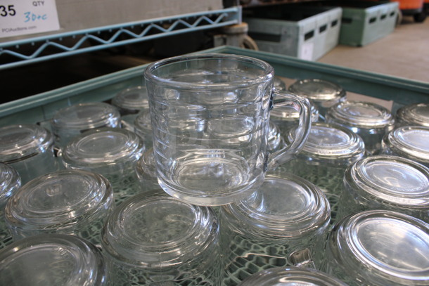 32 Glass Mugs in Dish Caddy. 4.5x3.5x3.5. 32 Times Your Bid!