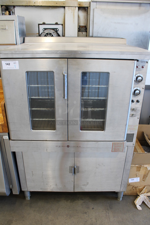 General Electric Stainless Steel Commercial Electric Powered Full Size Convection Oven w/ View Through Doors, Metal Oven Racks, Thermostatic Controls and Lower Pan Rack. 480 Volts, 3 Phase. 38x36x57