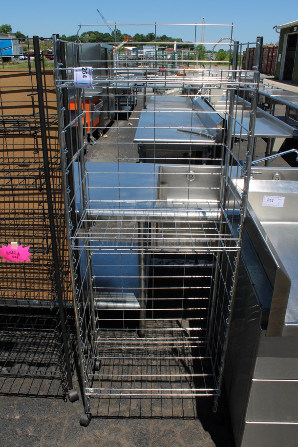 Metal 4 Tier Shelving Unit on Casters. 25x18x67 - Image 1 of 3