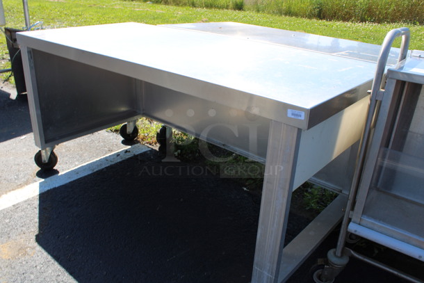 Stainless Steel Commercial Table on Commercial Casters. 62x29x30 - Image 3 of 4