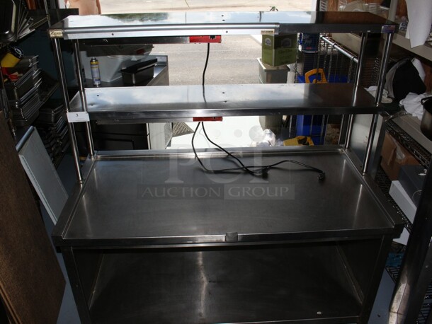 Eldorado SS Make Table on commercial casters with 2 Avantco heat lamps and a ticket holder rail - Image 1 of 7