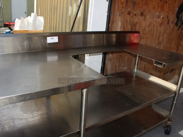 SS table on commercial casters w/two lower shelfs