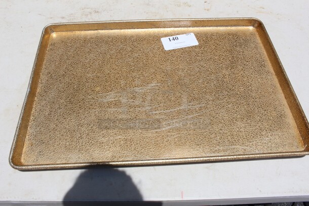 Gold sheet pan with detail