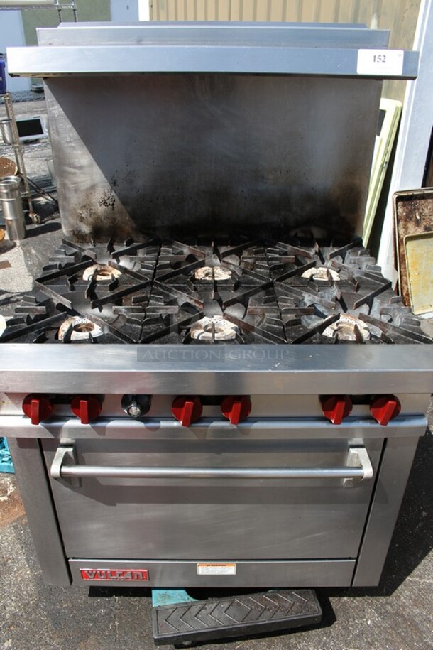 Six burner stove top Vulcan oven natural gas with overhead shelf 