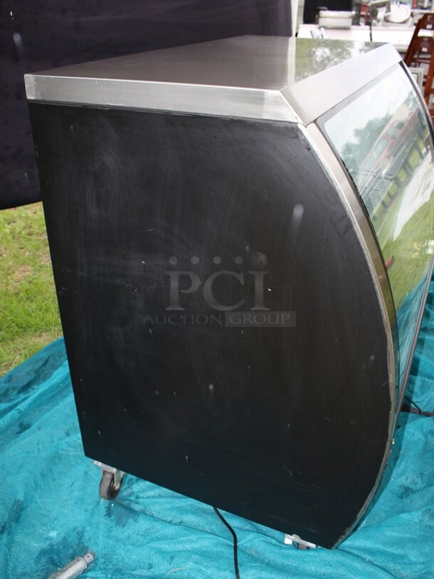 SUPER NICE Refrigerated display w/curved glass on commercial casters TESTED AND WORKING Model XDC120-8C  - Image 3 of 8