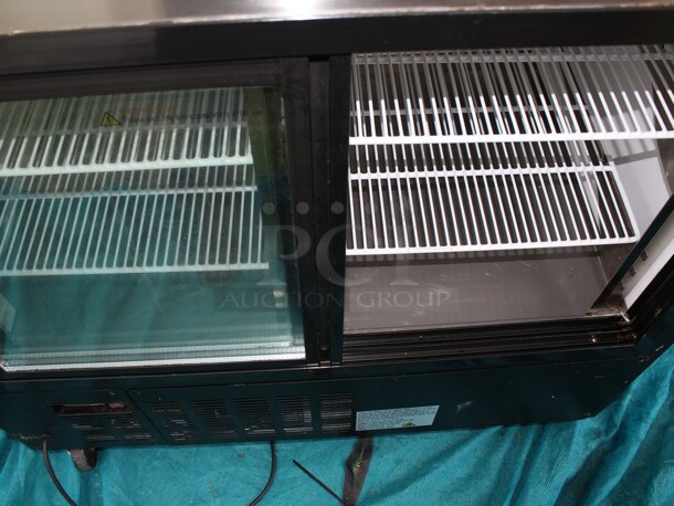 SUPER NICE Refrigerated display w/curved glass on commercial casters TESTED AND WORKING Model XDC120-8C  - Image 6 of 8
