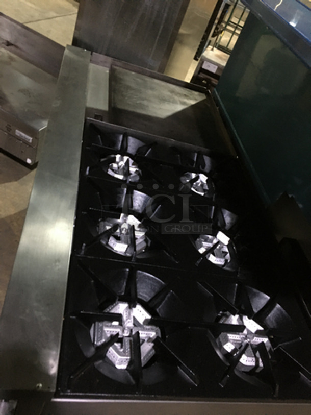 BEAUTIFUL! Sunfire Commercial Natural Gas Powered 6 Burner Stove! With Left Side Flat Griddle! With 2 Full Size Ovens Underneath! With Backsplash & Overhead Salamander Shelf! All Stainless Steel! On Casters! - Image 5 of 10