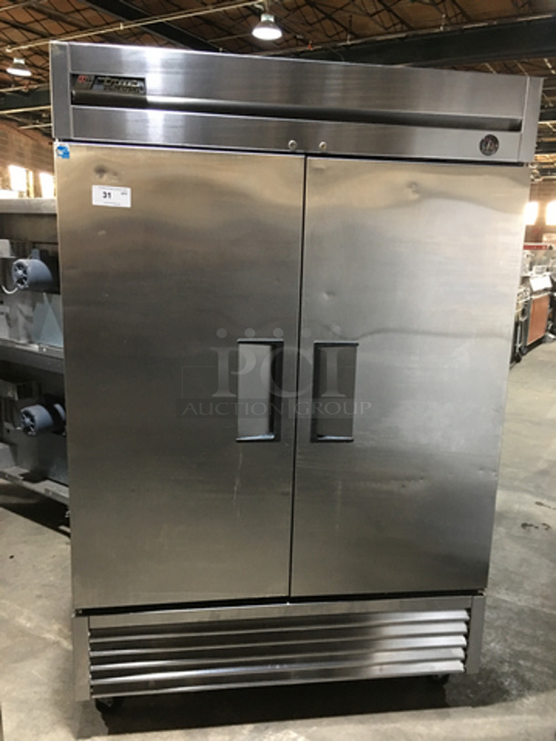 True Commercial 2 Door Reach In Cooler! All Stainless Steel! With Racks! Model T49 Serial 8079857! 115V 1 Phase! On Commercial Casters!