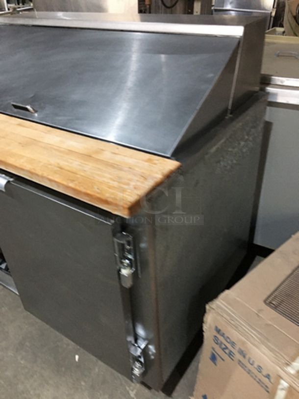 Leader Commercial Refrigerated Sandwich/Salad Prep Table! With Wooden Cutting Board! With 2 Door Storage Space Underneath! All Stainless Steel! Model LM48! 115V 1Phase! On Legs!
 - Image 2 of 7