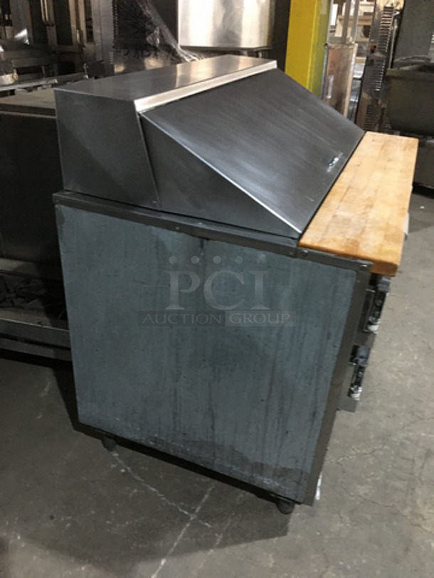 Leader Commercial Refrigerated Sandwich/Salad Prep Table! With Wooden Cutting Board! With 2 Door Storage Space Underneath! All Stainless Steel! Model LM48! 115V 1Phase! On Legs!
 - Image 3 of 7