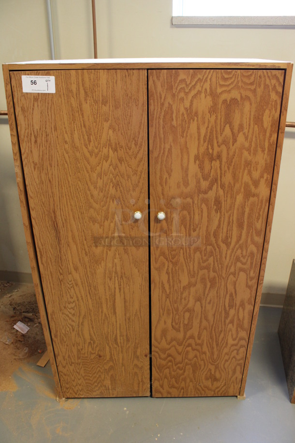 Wood Pattern 2 Door Cabinet. 53x16.5x59. (Room 130)