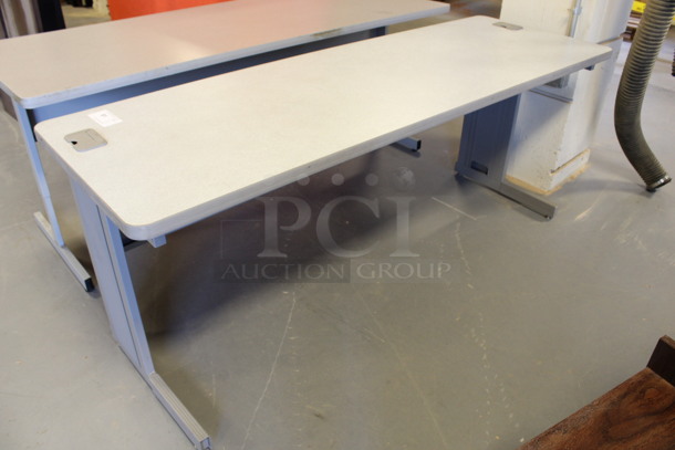 Gray Table. 72x24x29.5. (Room 130)