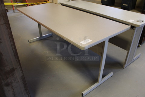 Gray Table. 72x30x29.5. (Room 130)