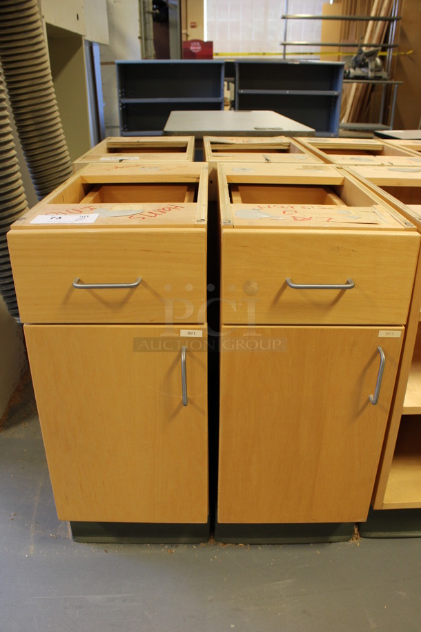 4 Wooden Cabinets w/ Drawer and Door. Stock Picture - Cosmetic Condition May Vary. 12x24.5x29. 4 Times Your Bid! (Room 130)