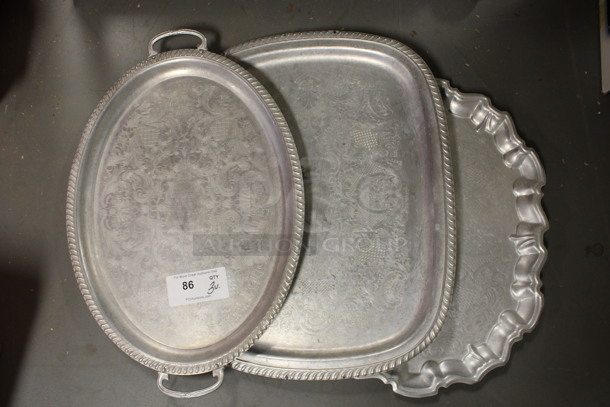 3 Various Metal Serving Trays. Includes 24.5x16x1. 3 Times Your Bid! (Room 130)