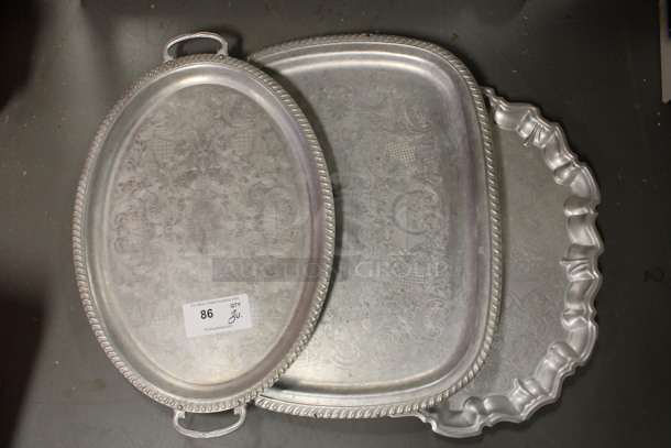 3 Various Metal Serving Trays. Includes 24.5x16x1. 3 Times Your Bid! (Room 130) - Image 1 of 4