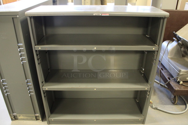 Gray Metal 3 Tier Bookshelf. 37.5x14.5x42. (Room 130) - Image 1 of 4