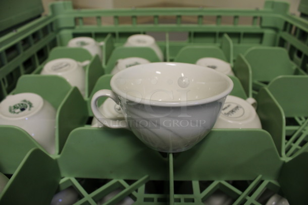 16 White Ceramic Mugs in Dish Caddy. 4.5x4x2.5. 16 Times Your Bid! (Room 130)