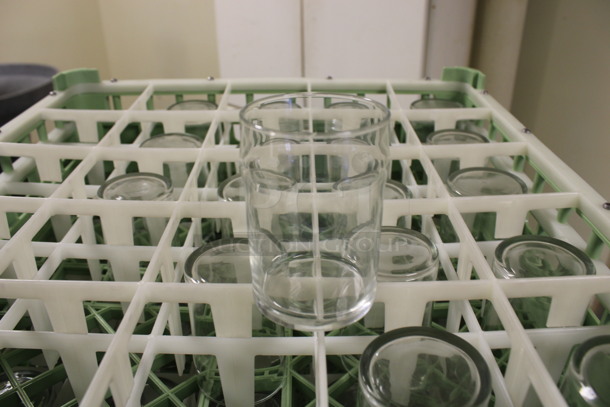 18 Beverage Glasses in Dish Caddy. 2.5x2.5x3.75. 18 Times Your Bid! (Room 130)
