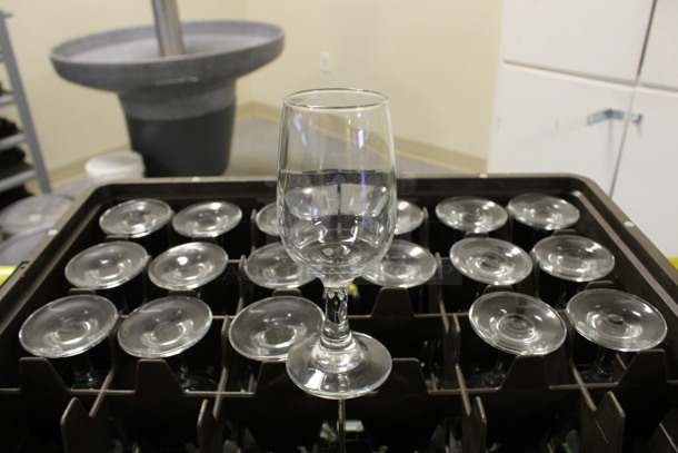 18 Wine Glasses in Dish Caddy. 2.5x2.5x6.25. 18 Times Your Bid! (Room 130)