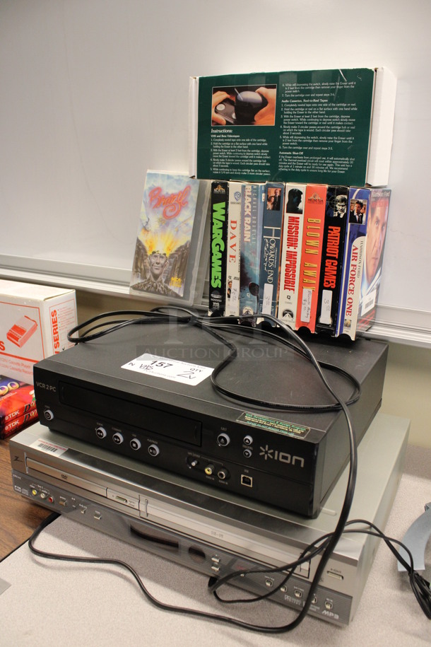 ALL ONE MONEY! Lot of Ion VCR, Zenith DVD VCR Player and Various VHS Tapes Including Air Force One, Patriot Games and Black Rain. 17x111.5x4, 14x11.5x4. (2nd Floor: Room 220) - Image 2 of 5