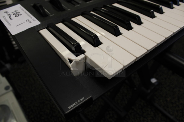 Yamaha Model DX11 Keyboard on Stand w/ 4 Music Books.120 Volts, 1 Phase. 35.5x11x2, 21x20x34. (2nd Floor: Room 220) - Image 3 of 10