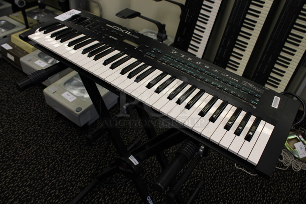 Yamaha Model DX11 Keyboard on Stand w/ 4 Music Books.120 Volts, 1 Phase. 35.5x11x2, 21x20x34. (2nd Floor: Room 220) - Image 8 of 10