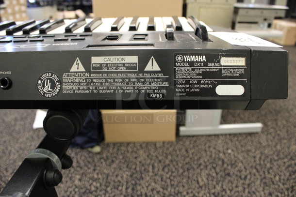 Yamaha Model DX11 Keyboard on Stand w/ 4 Music Books.120 Volts, 1 Phase. 35.5x11x2, 21x20x34. (2nd Floor: Room 220) - Image 9 of 10